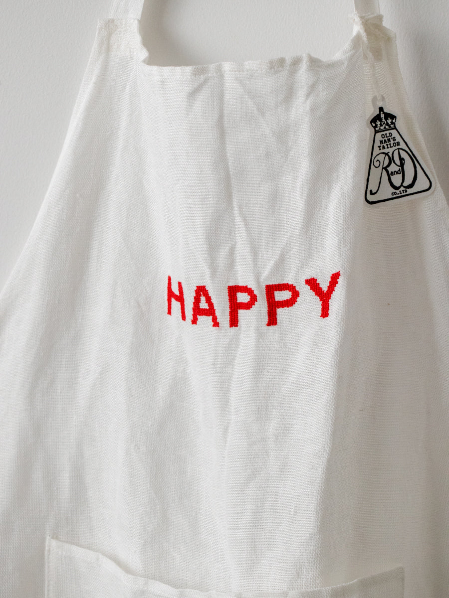 APRON A: HAPPY